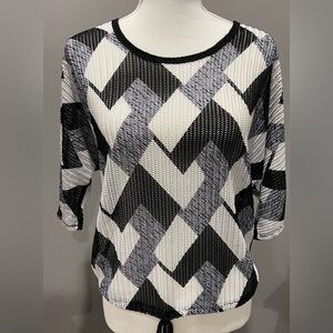 Modern Black and White Ribbed Blouse with Graphic Design